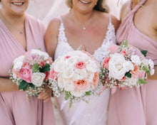 Load image into Gallery viewer, Three women in pink dresses holding floral bouquets for ideas on Wedding flowers Perth
