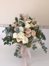 Load image into Gallery viewer, Bouquet of Beautiful pastel roses with light and airy foliage and filler in a hand tied bouquet gift wrapped in complimenting paper and a beautiful bow, delivered with a water bag for freshness. choice of 10 or 18 stems .