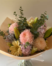Load image into Gallery viewer, Bouquet of flowers with pink, yellow, and green colors on a neutral background

