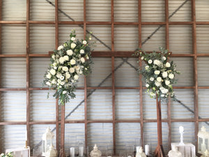 beautiful fresh flowers for Wedding arbour of your choice,we can create a 2 sided design with in season blooms and foliages like roses ,disbuds,orchids,lisianthus,natives .this is to frame the happy couple whilst saying their I do's.