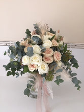 Load image into Gallery viewer, Bouquet of Beautiful pastel roses with light and airy foliage and filler in a hand tied bouquet gift wrapped in complimenting paper and a beautiful bow, delivered with a water bag for freshness. choice of 10 or 18 stems .
